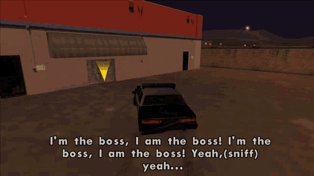 a police car is in a parking lot and says i 'm the boss i 'm the boss i 'm the boss