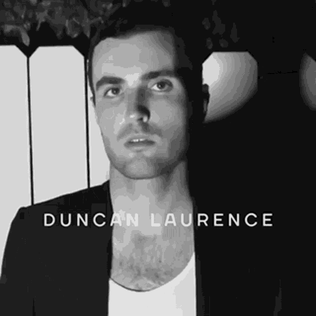 a black and white photo of a man with the name duncan laurence on it