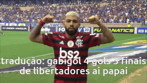 a soccer player in a red and black jersey with bs2 on the front