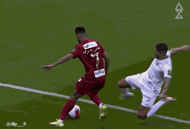 a soccer player wearing a red shirt with the number 1 on it