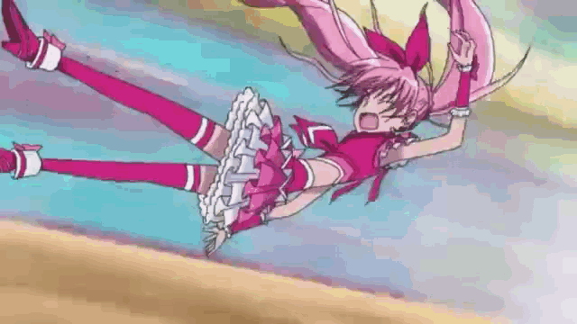 a girl with pink hair is flying through the air in a pink dress .