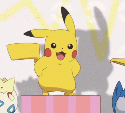 a pikachu is standing on top of a pink striped box .