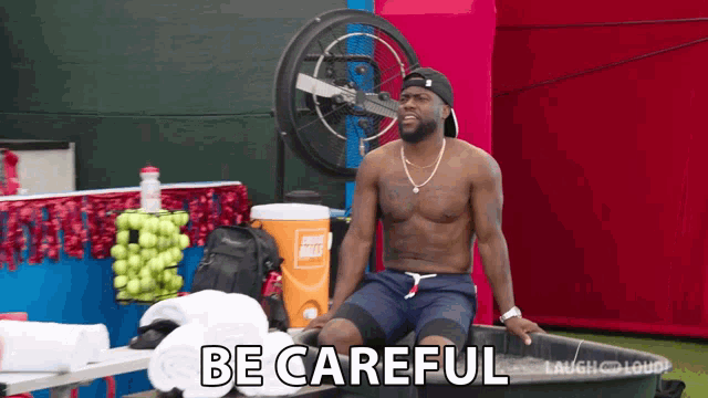 a shirtless man sits on a bench with the words be careful written below him