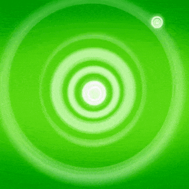 a green background with a white circle in the middle of it