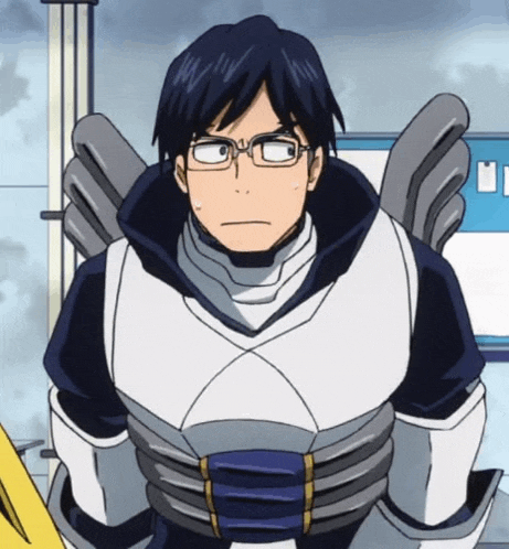 a man wearing glasses and a blue and white suit