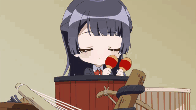 a cartoon girl is holding two maracas in her hands
