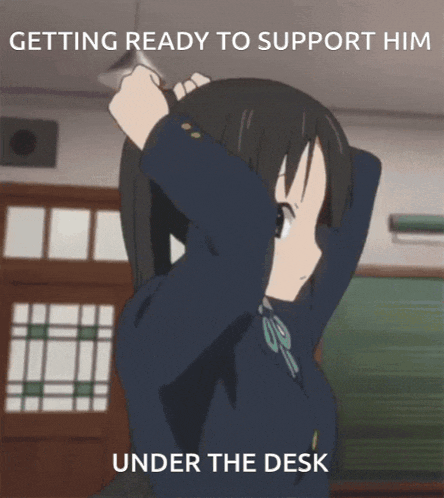 a picture of a girl with a caption that says getting ready to support him under the desk