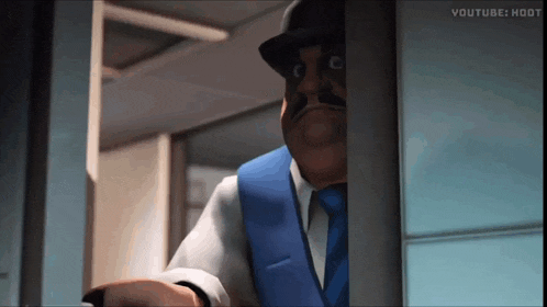 a man with a mustache and hat is standing in a doorway ..