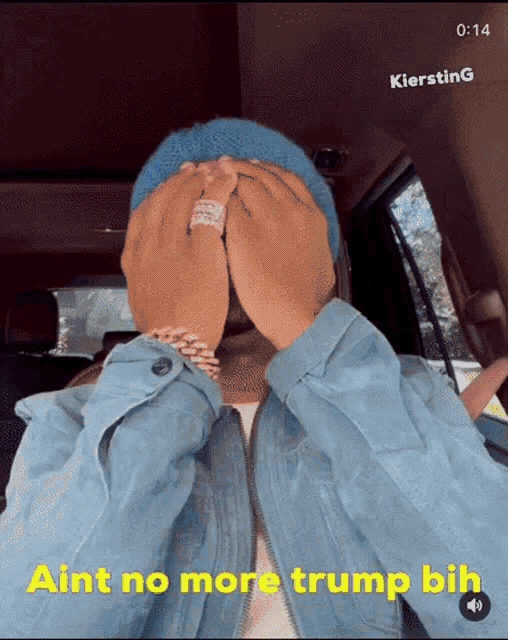 a person covering their face with their hands with the words ain t no more trump bih