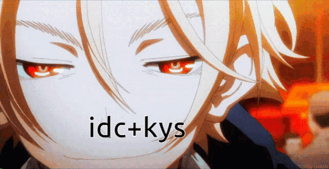 a close up of a person 's face with the words idc + kys written below it