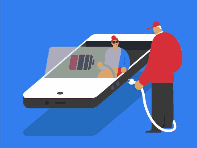 a man in a red hat is charging a phone