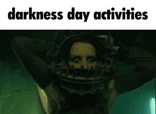 a picture of a woman wearing a helmet that says darkness day activities on it