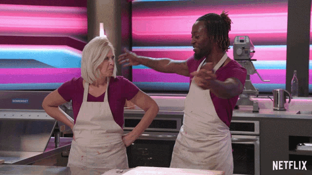 a man and a woman are in a kitchen with a netflix logo in the corner