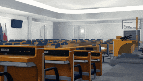 a row of wooden desks in a room with a sign on the wall that says ' sędzia ' on it