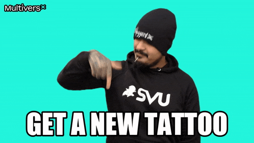 a man with a beard wearing a svu hoodie