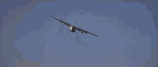 a plane is flying through a blue sky and has the letters ns on the nose