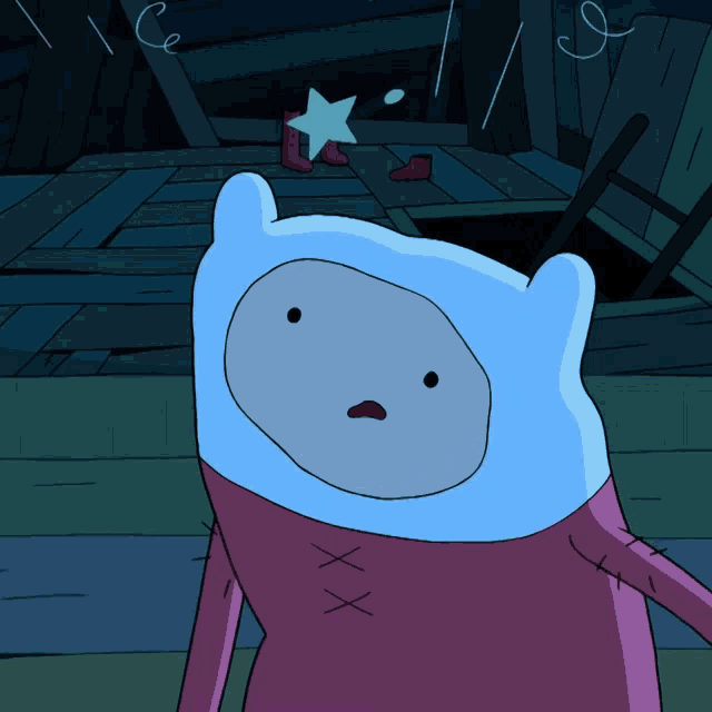 a cartoon character with a blue head and a pink shirt with stitching on it