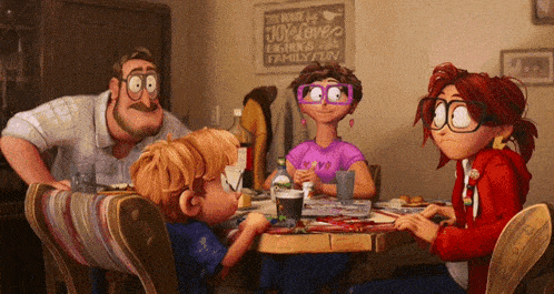 a family sits at a table in front of a sign that says the house of joy loves