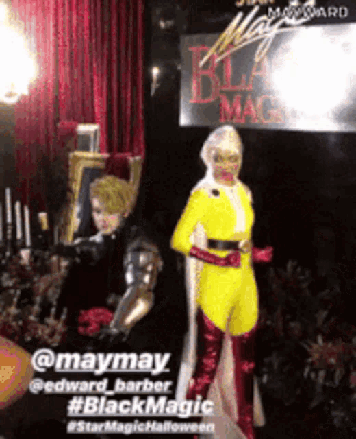 a woman in a yellow costume is standing next to a man in a black costume