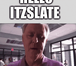 a man in a purple shirt is looking at the camera and says hello itzslate