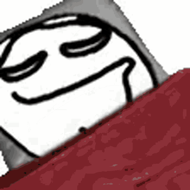 a cartoon character is laying in a bed with a red blanket .