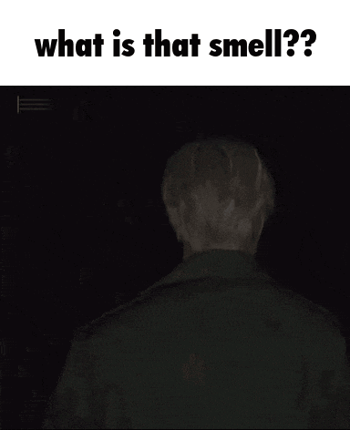a man with his eyes closed and the words what is that smell