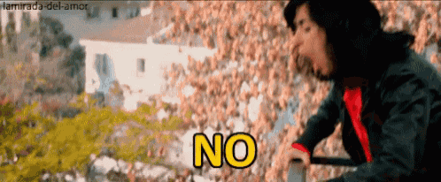 a man in a black jacket and red shirt says no