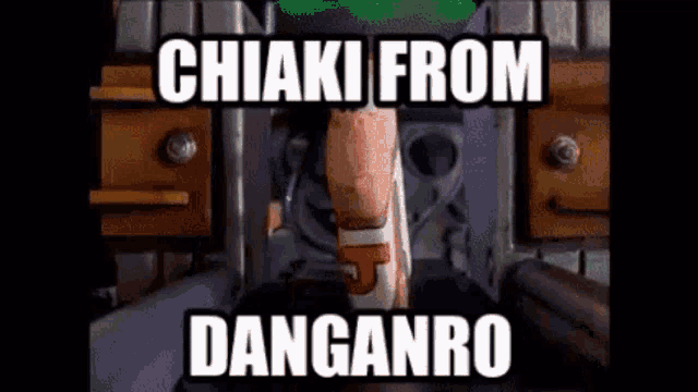 a cartoon character is standing in front of a machine with a caption that says chiaki from danganro .