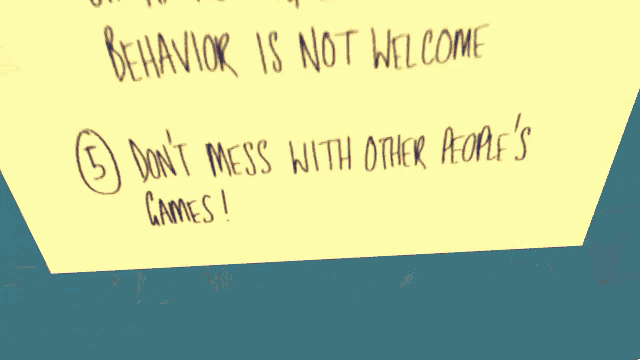 a sign that says do n't play games is on a wall