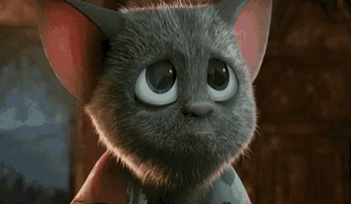 a close up of a cartoon cat with a sad look on his face