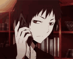 a anime character is talking on a cell phone
