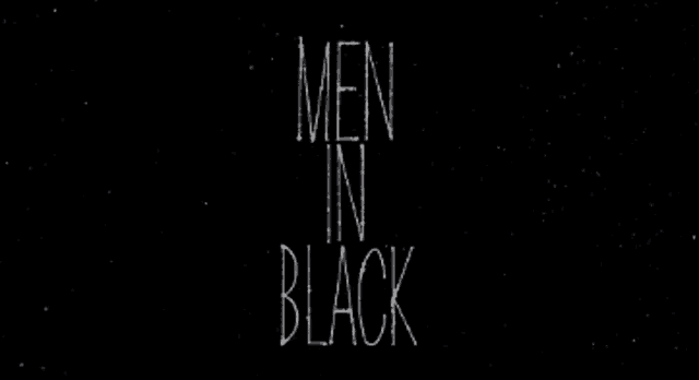 a black background with the words men in black written in white