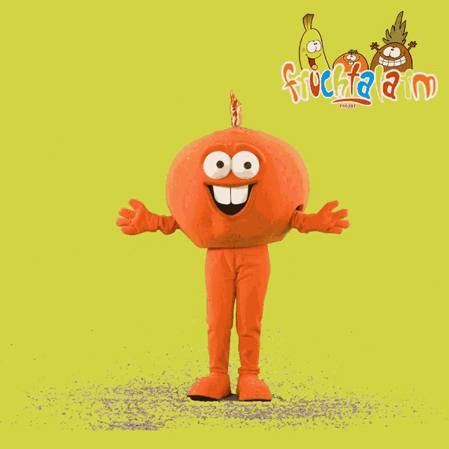 an orange mascot is standing in front of a yellow background that says frutaland