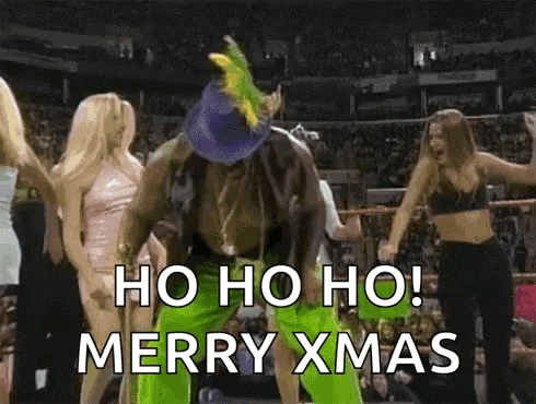 a man in a purple hat is dancing in front of a crowd with the words ho ho ho merry xmas