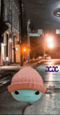 a cartoon character wearing a pink hat is walking down a street