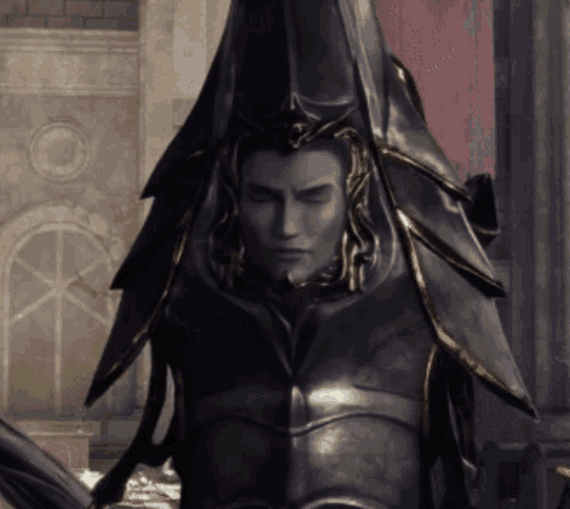 a statue of a man with his eyes closed wearing a black and gold armor