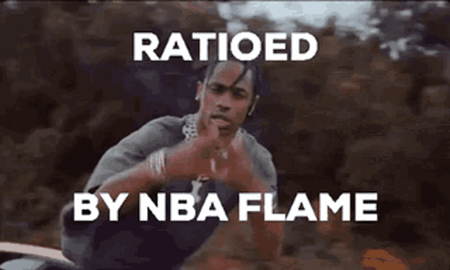 a man with a chain around his neck is standing in a field with the words ratioed by nba flame above him .
