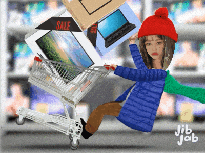 a girl in a red hat is being pushed by a shopping cart full of boxes and a laptop