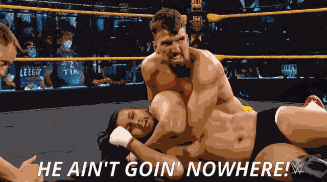 a wrestling match with the words he ain t goin nowhere