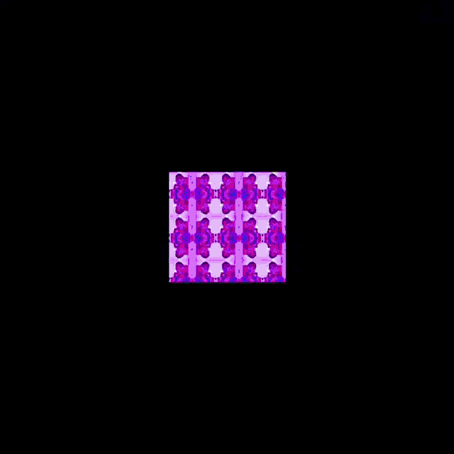 a purple and pink kaleidoscope with a man giving the peace sign