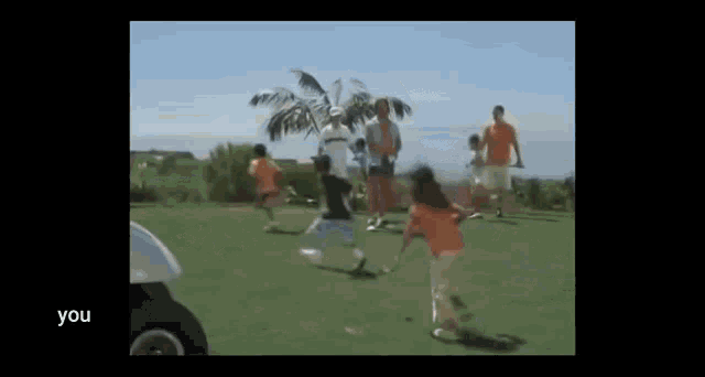 a group of people are playing golf on a golf course and the words you are on the bottom left