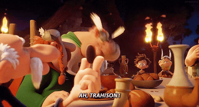 a group of cartoon characters are sitting around a table with one saying ah trahison