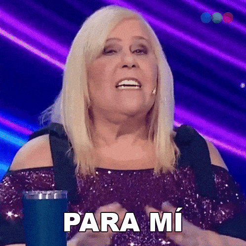 a woman in a purple dress says para mi in spanish