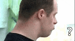 a close up of a man 's neck with a question mark next to him .