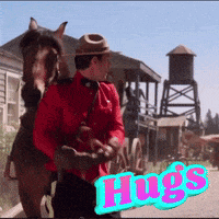 a picture of a man riding a horse with the word hugs in the corner