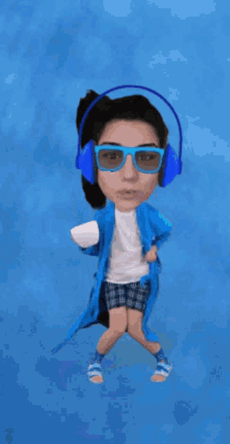 a person wearing headphones and sunglasses is holding a cup