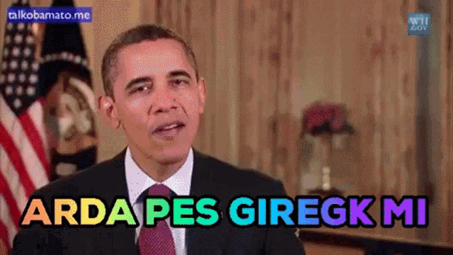 a man in a suit and tie says " arda pes giregk mi "