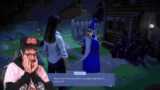 a man wearing headphones is playing a video game with a wizard