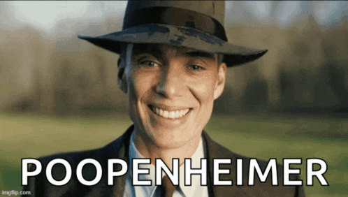 a man in a suit and hat is smiling with the words poopenheimer behind him