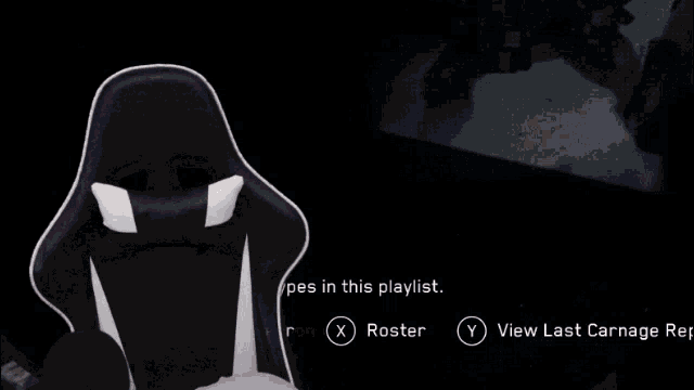 a person playing a video game with a playlist button in the upper right corner